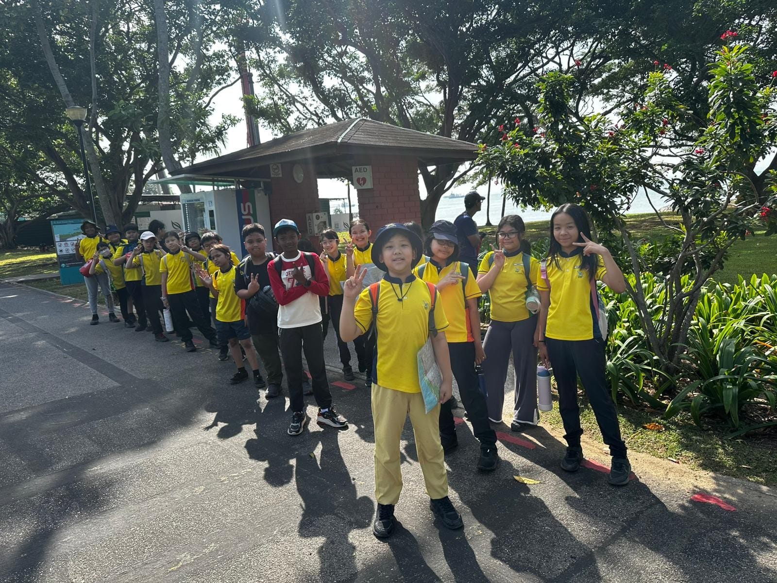Students have fun walking under the sun and enjoying the nature with their friends and classmates